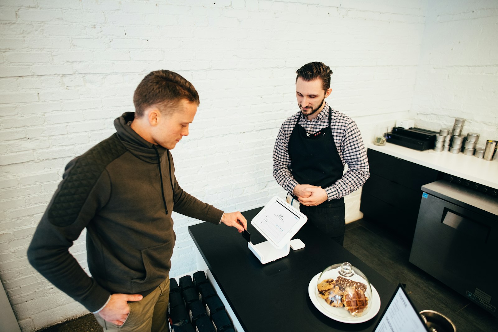 Team reviewing a WordPress services plan on a laptop in an office