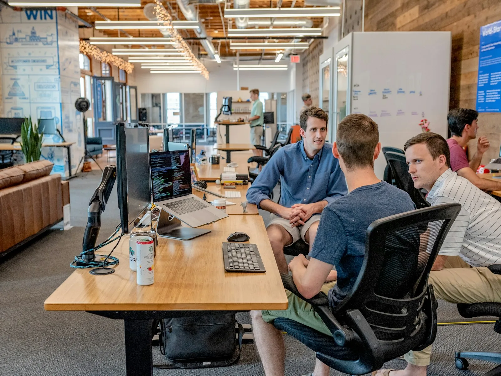Business team planning AI implementation and workflow automation in a modern office