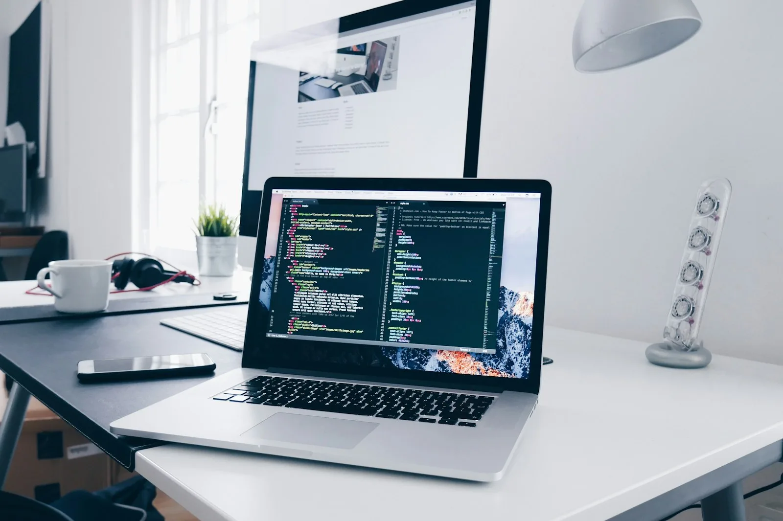 Developer reviewing a WordPress site migration on a laptop