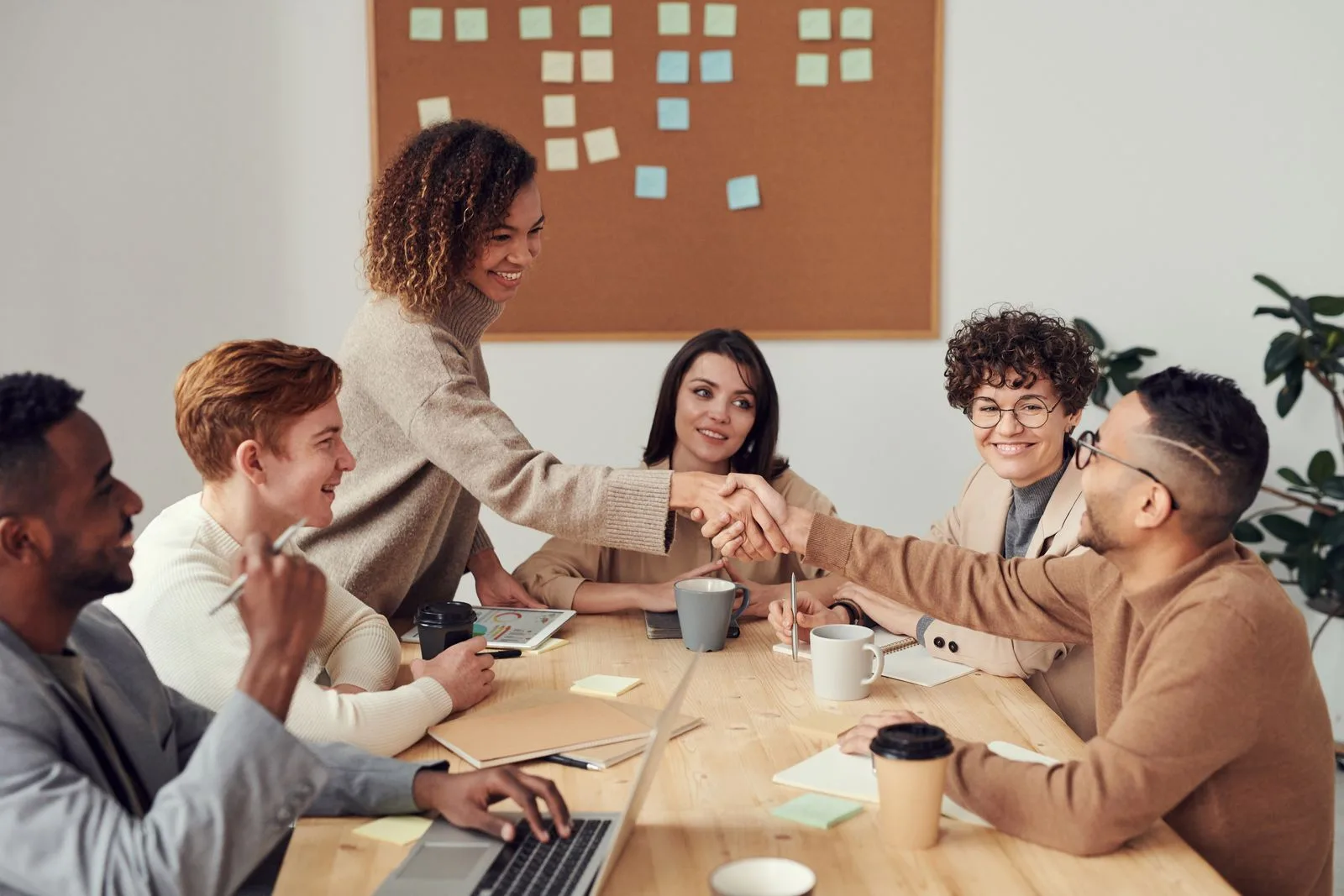Business team reviewing AI implementation plans in a modern office