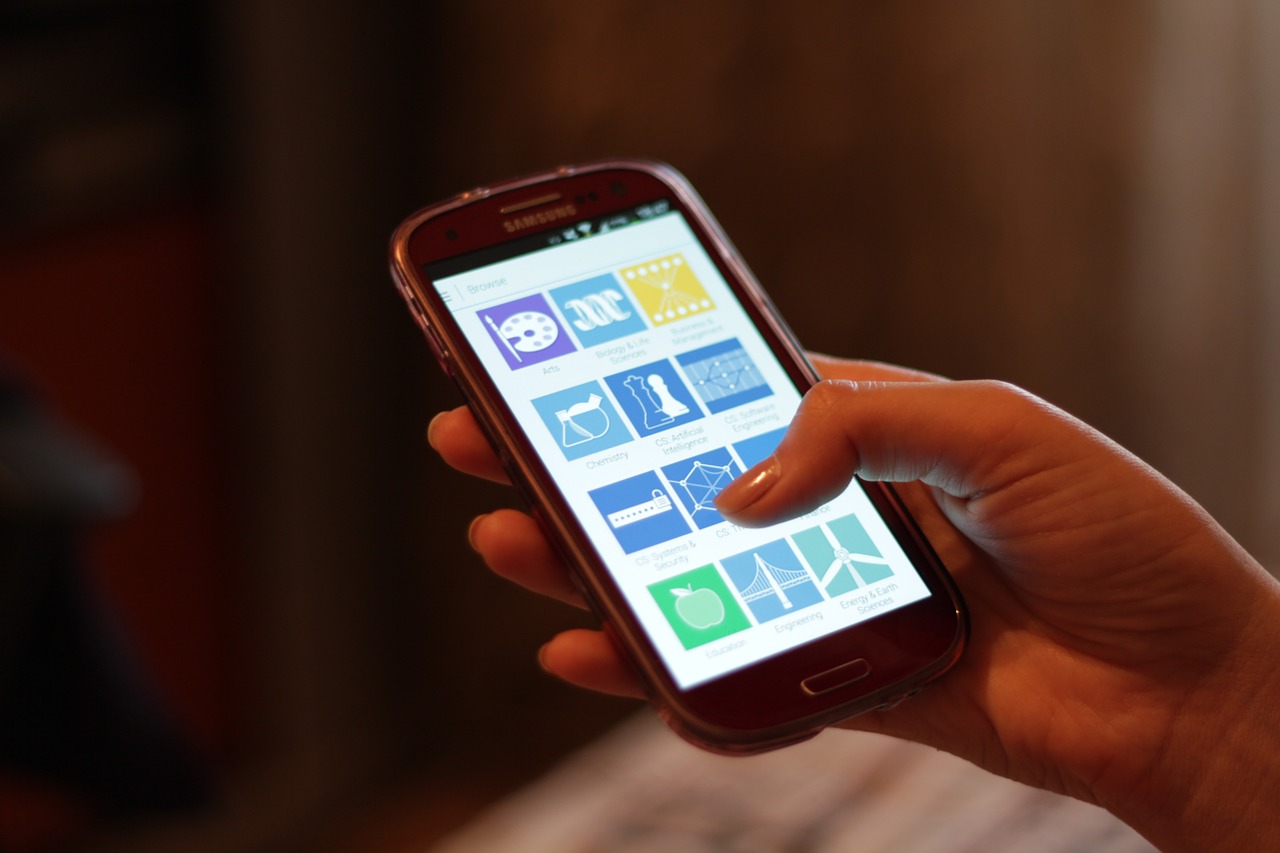 Customer using a smartphone to browse and buy products in a mobile shopping experience