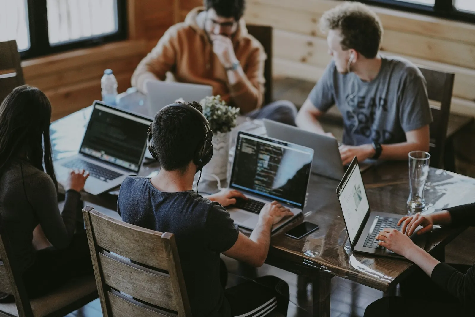 Houston business team planning an AI automation workflow around a conference table