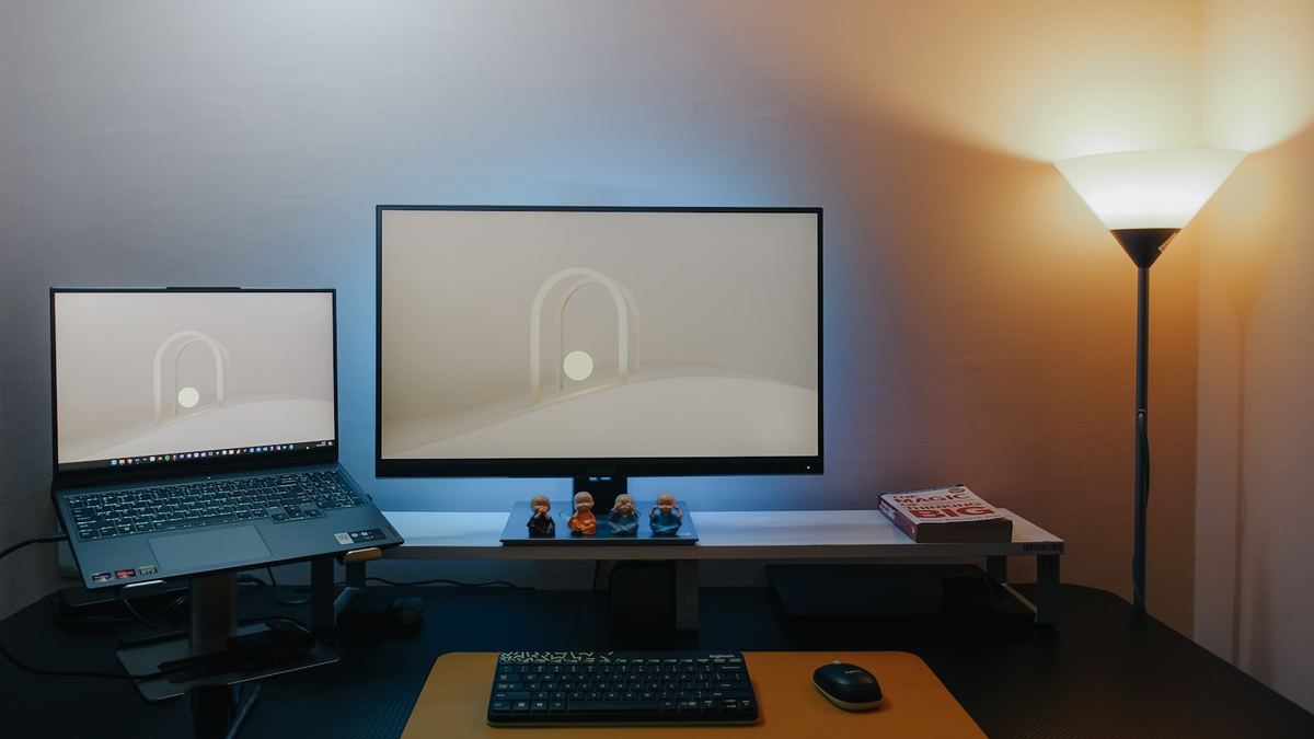 Laptop and monitor at a workspace used for WordPress blog development