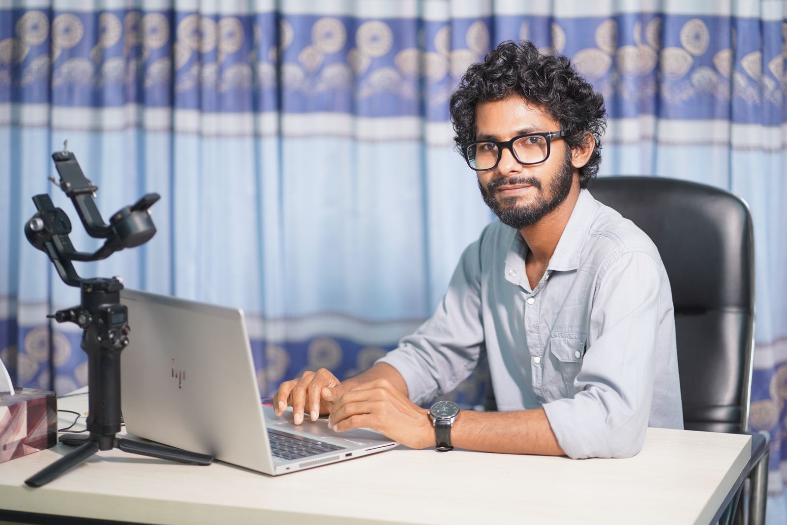 Web developer working on a laptop while planning a WordPress theme