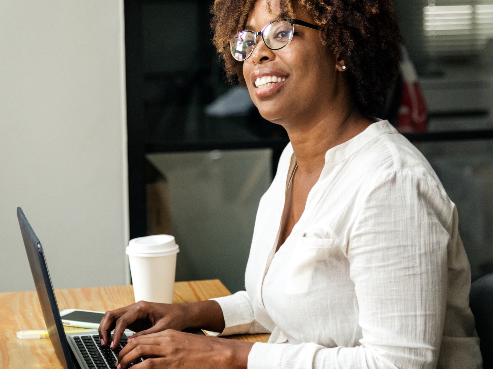 Business owner reviewing a website handover package on a laptop
